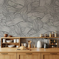 Monochromatic Striped Maze wall mural of woven black lines above a wood kitchen counter and shelves