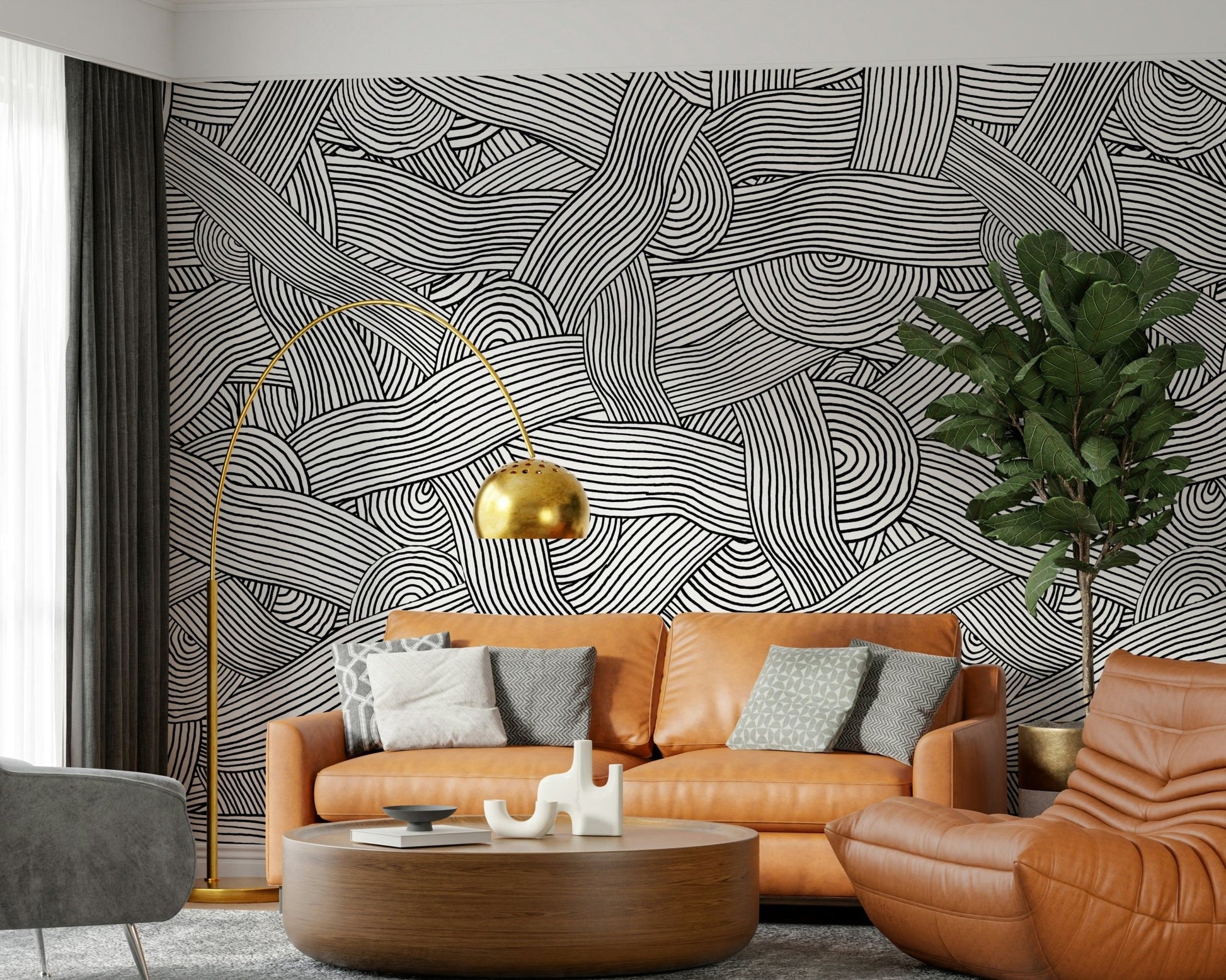 Monochromatic Striped Maze wall mural of woven lines behind a tan leather sofa in a living room