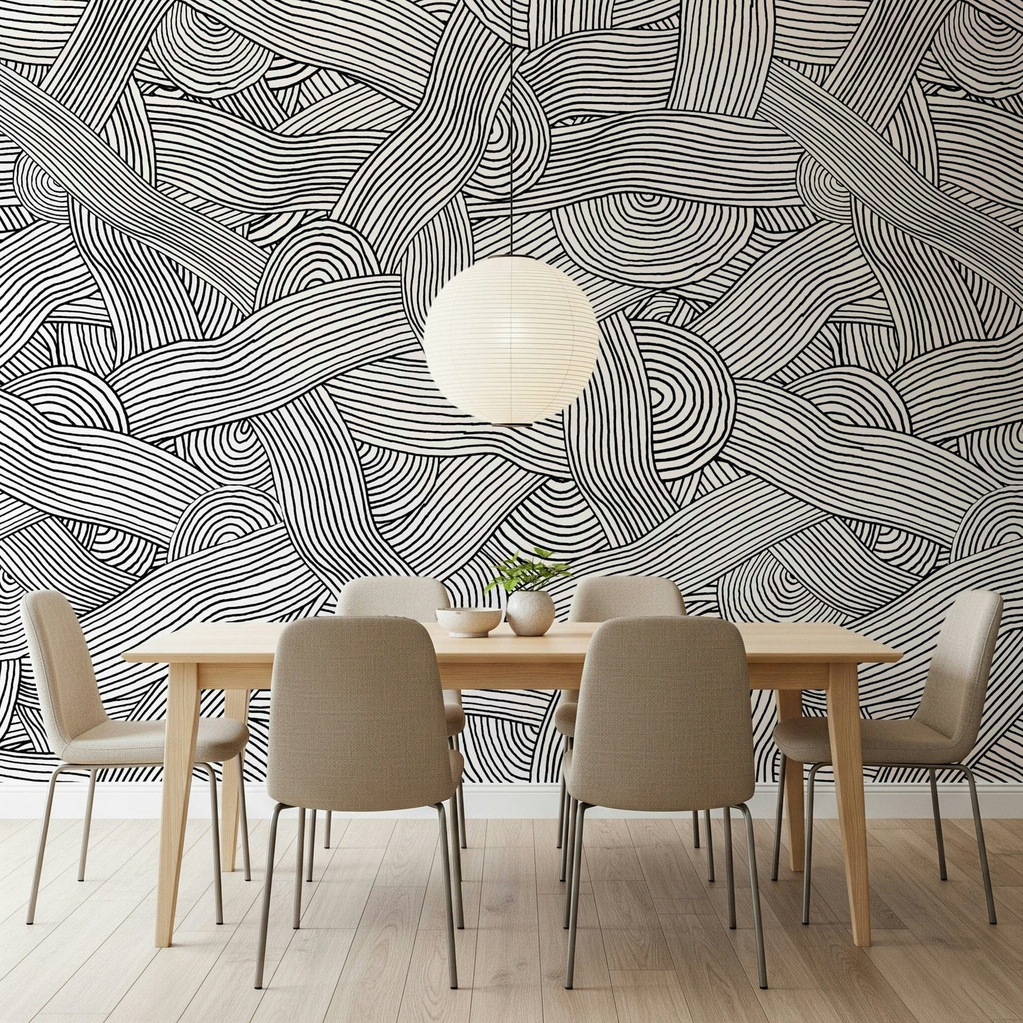 Monochromatic Striped Maze wall mural in black and white above a wood dining table in a dining room