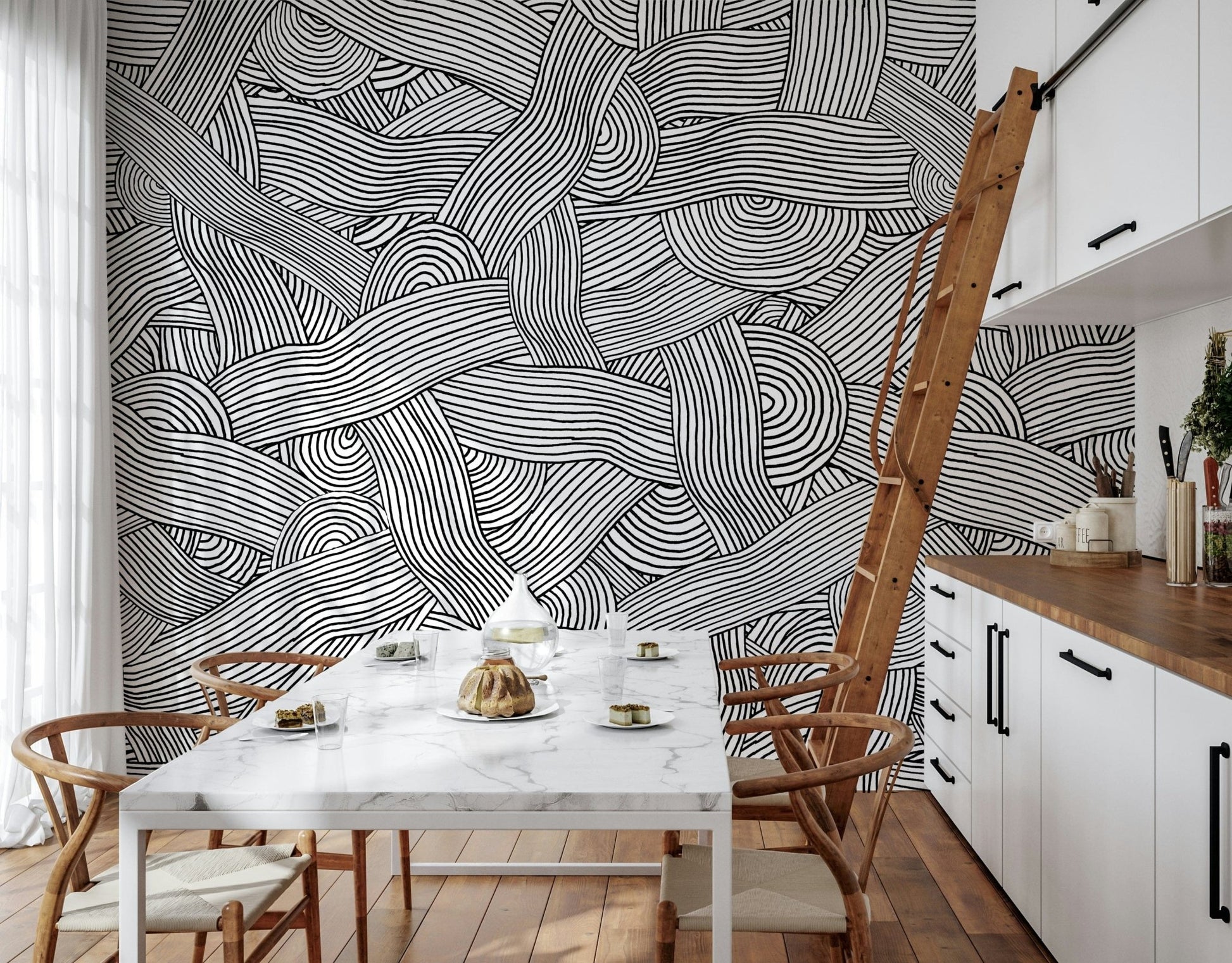 Monochromatic Striped Maze wall mural of swirling lines behind a marble table in a bright kitchen