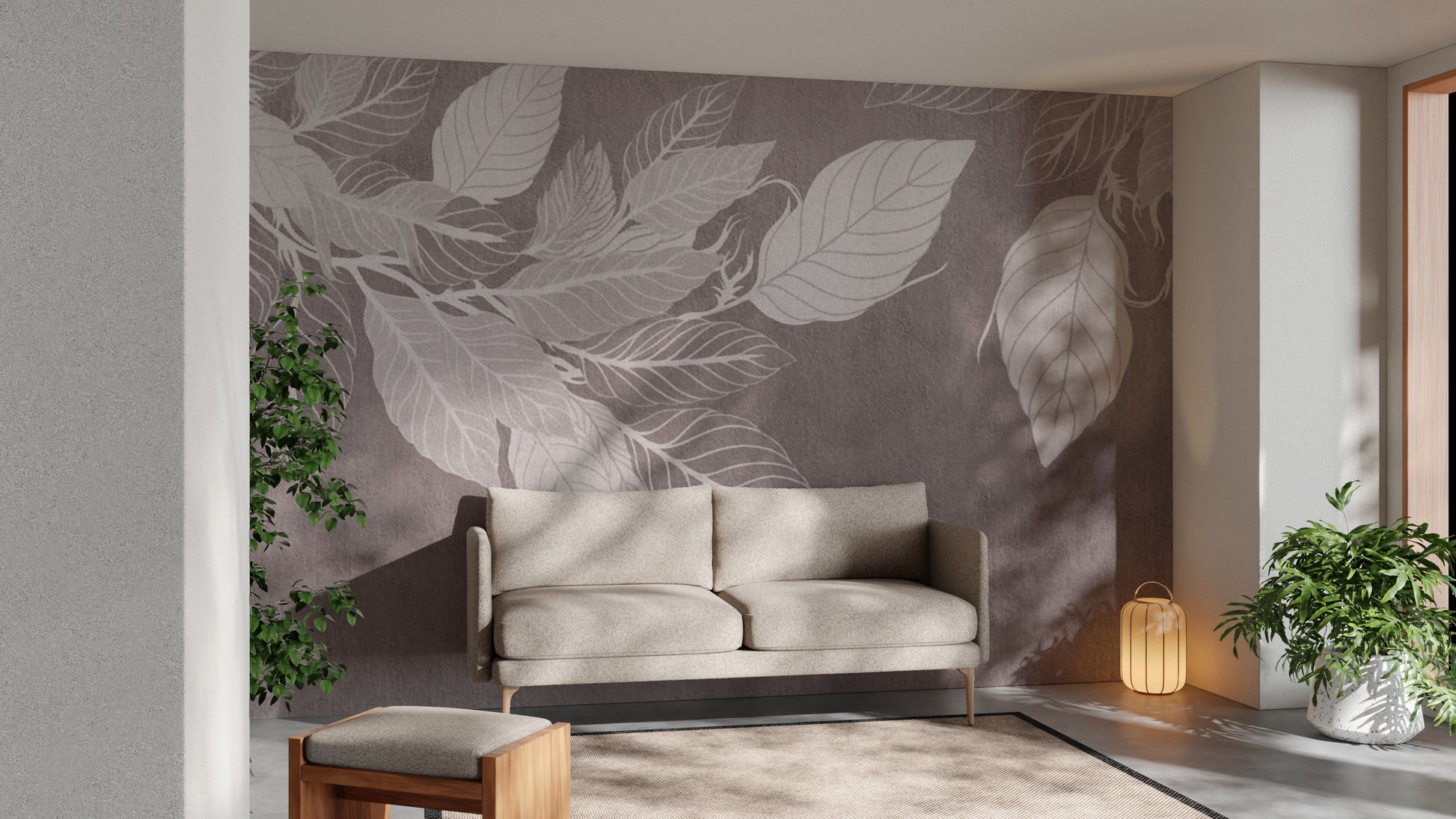 Monochrome Botanical Leaf wall mural with white leaves on taupe behind a beige two-seater sofa and lantern in a living room