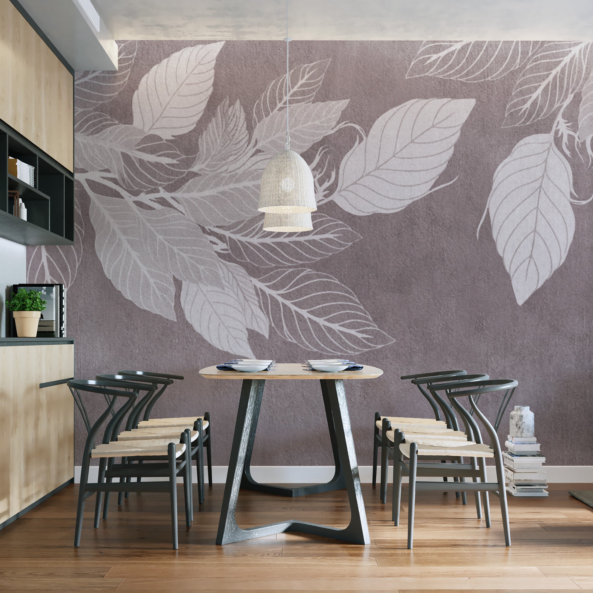 Monochrome Botanical Leaf wall mural with white leaves on mauve behind a wooden table and woven chairs in a kitchen diner