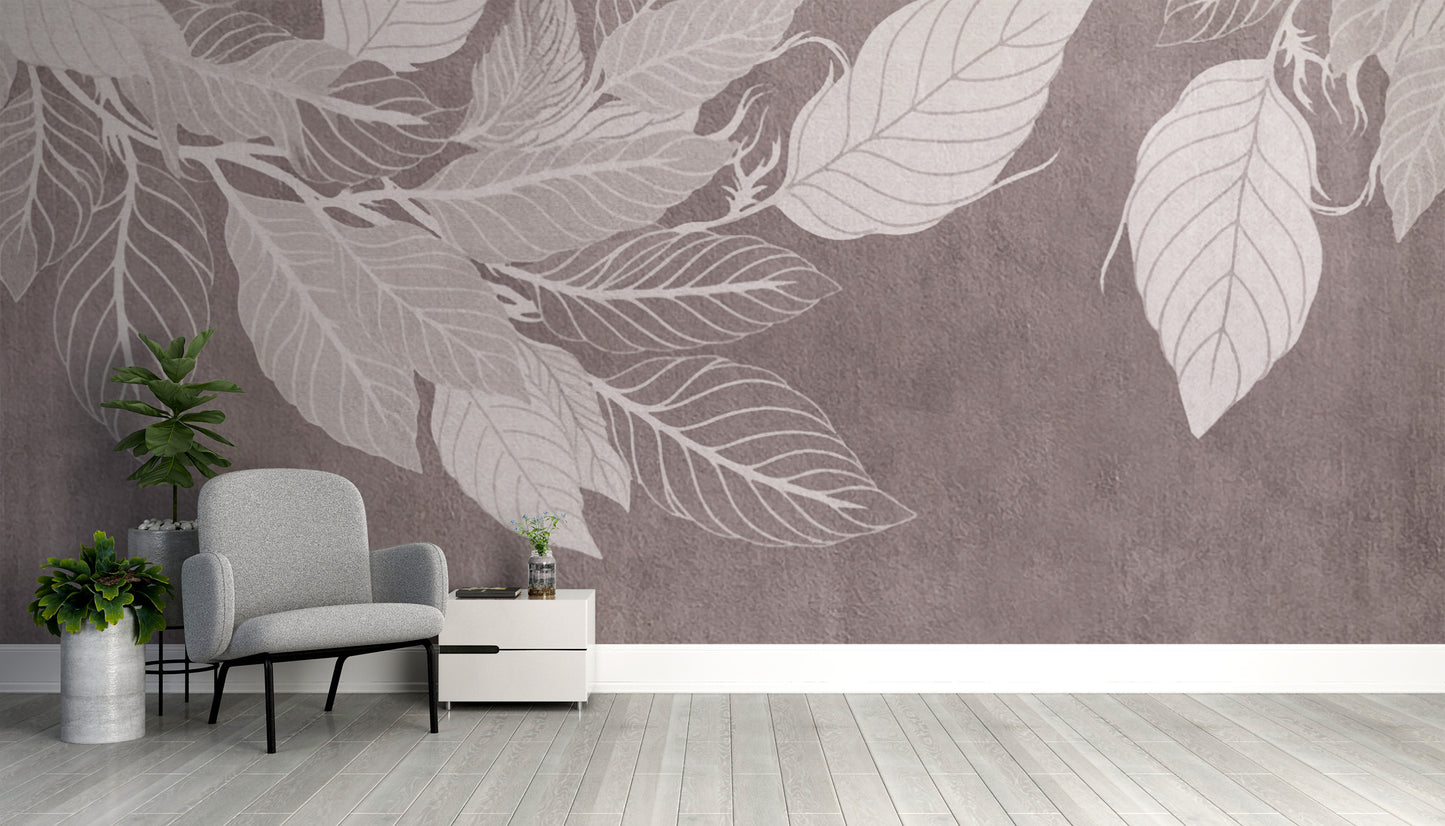Monochrome Botanical Leaf wall mural with large white leaves on mauve behind a grey armchair in a cosy reading corner