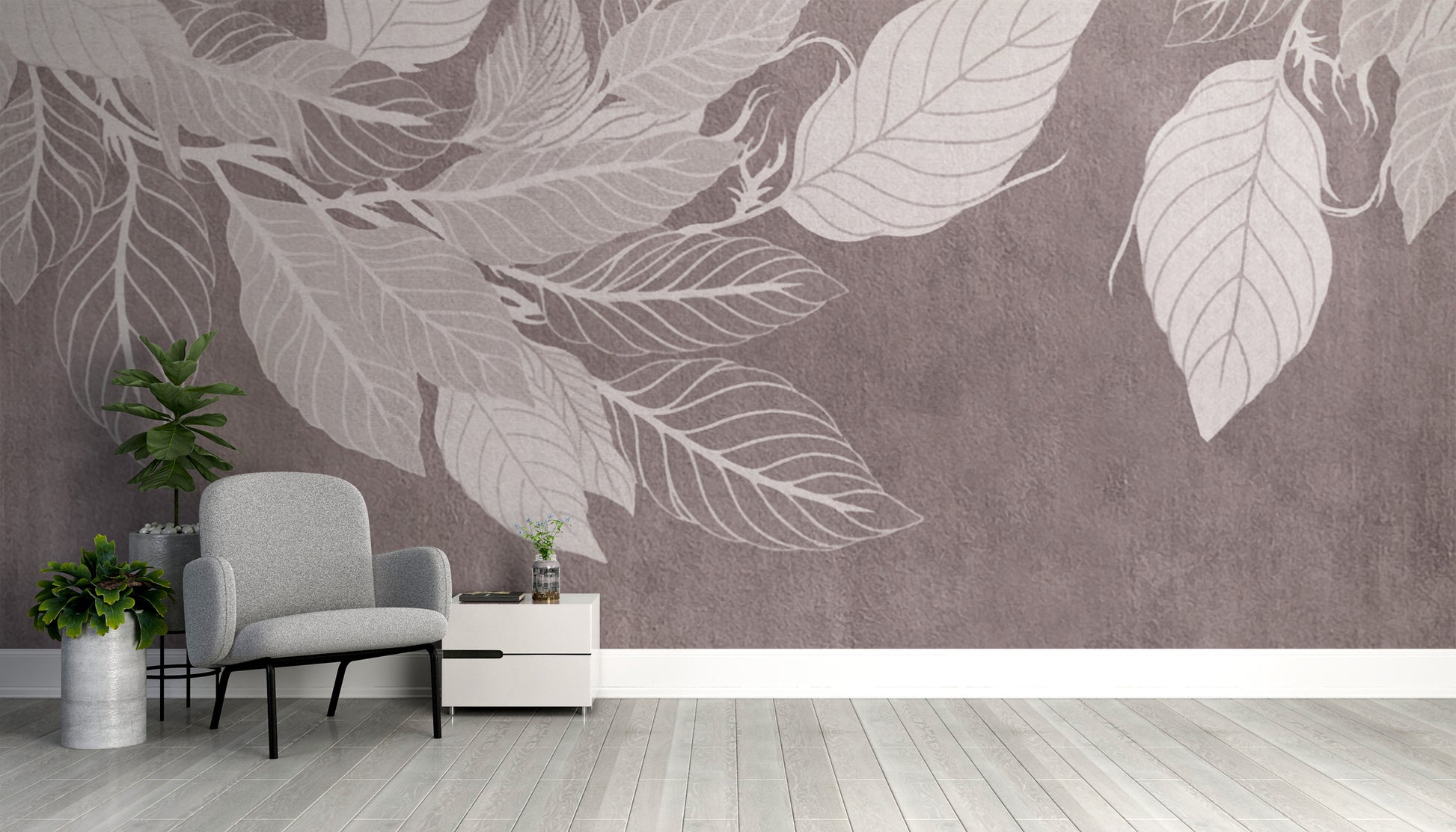 Monochrome Botanical Leaf wall mural with large white leaves on mauve behind a grey armchair in a cosy reading corner