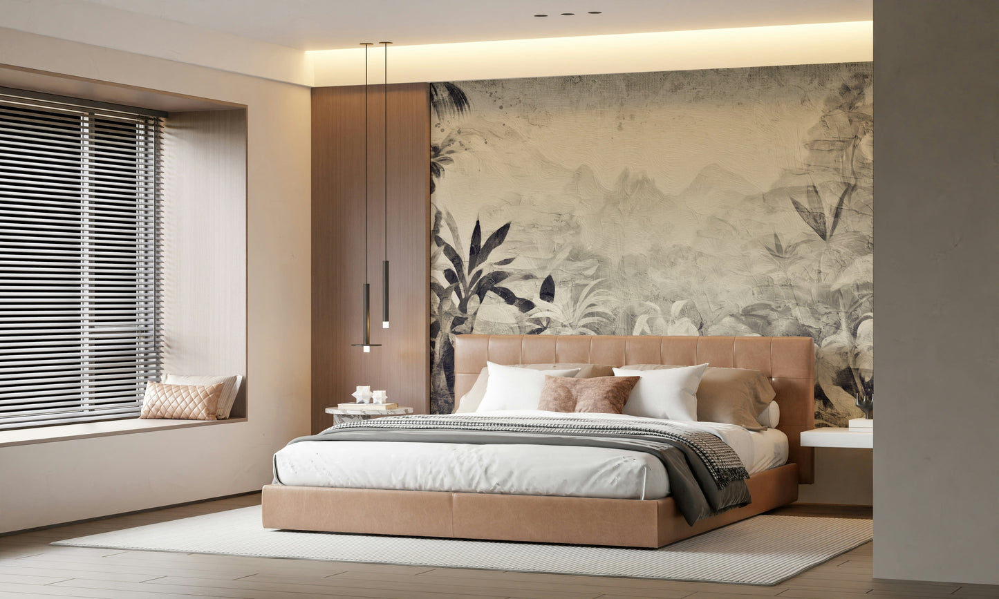 Monochrome Jungle Dream wallpaper mural in grey jungle tones behind a tan leather bed with wood panel and pendants