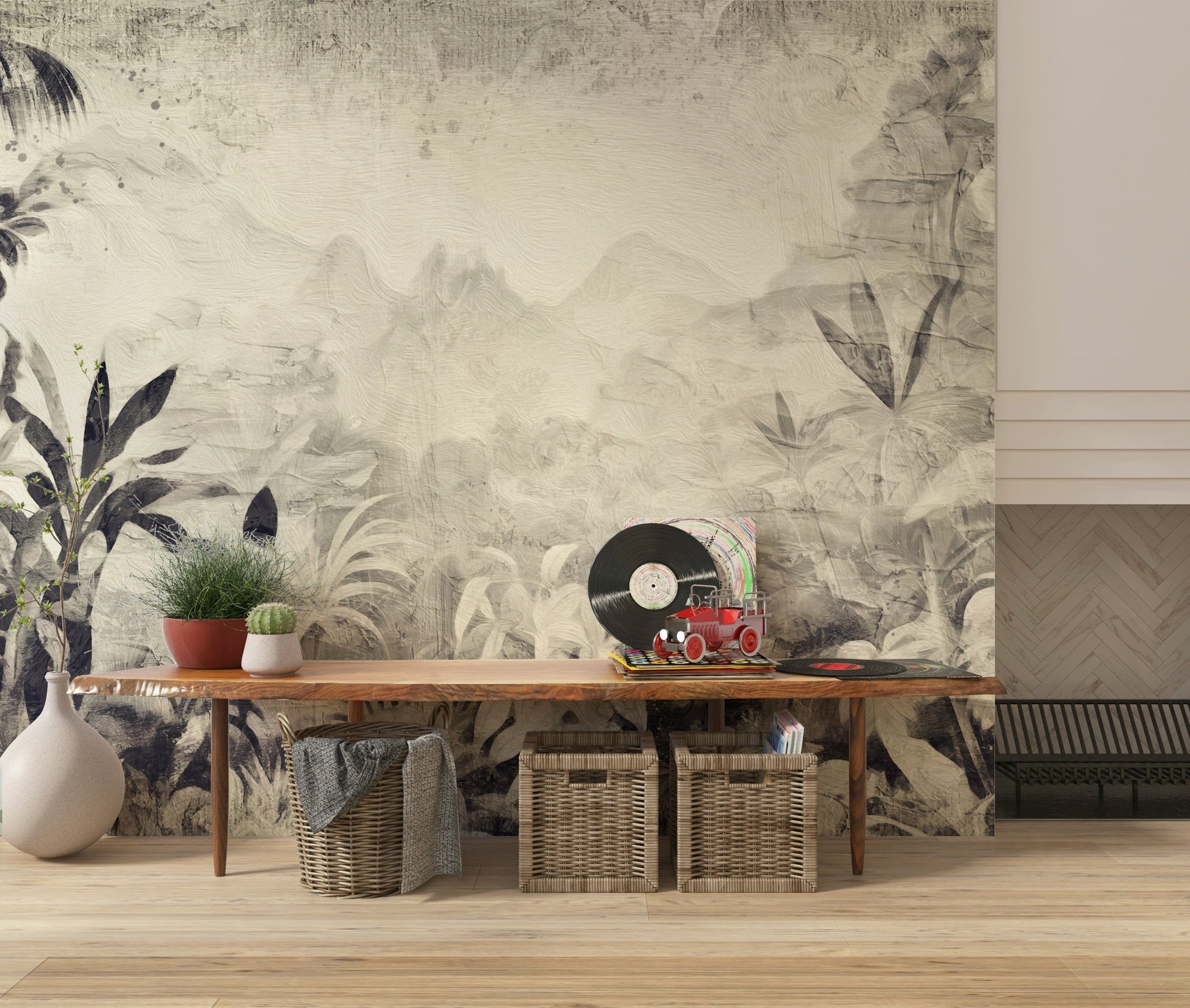 Monochrome Jungle Dream wallpaper mural of misty grey jungle behind a live-edge wood bench and wicker baskets