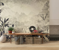 Monochrome Jungle Dream wallpaper mural of misty grey jungle behind a live-edge wood bench and wicker baskets