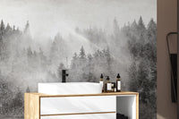 Monochrome woodland wallpaper with dense pines
