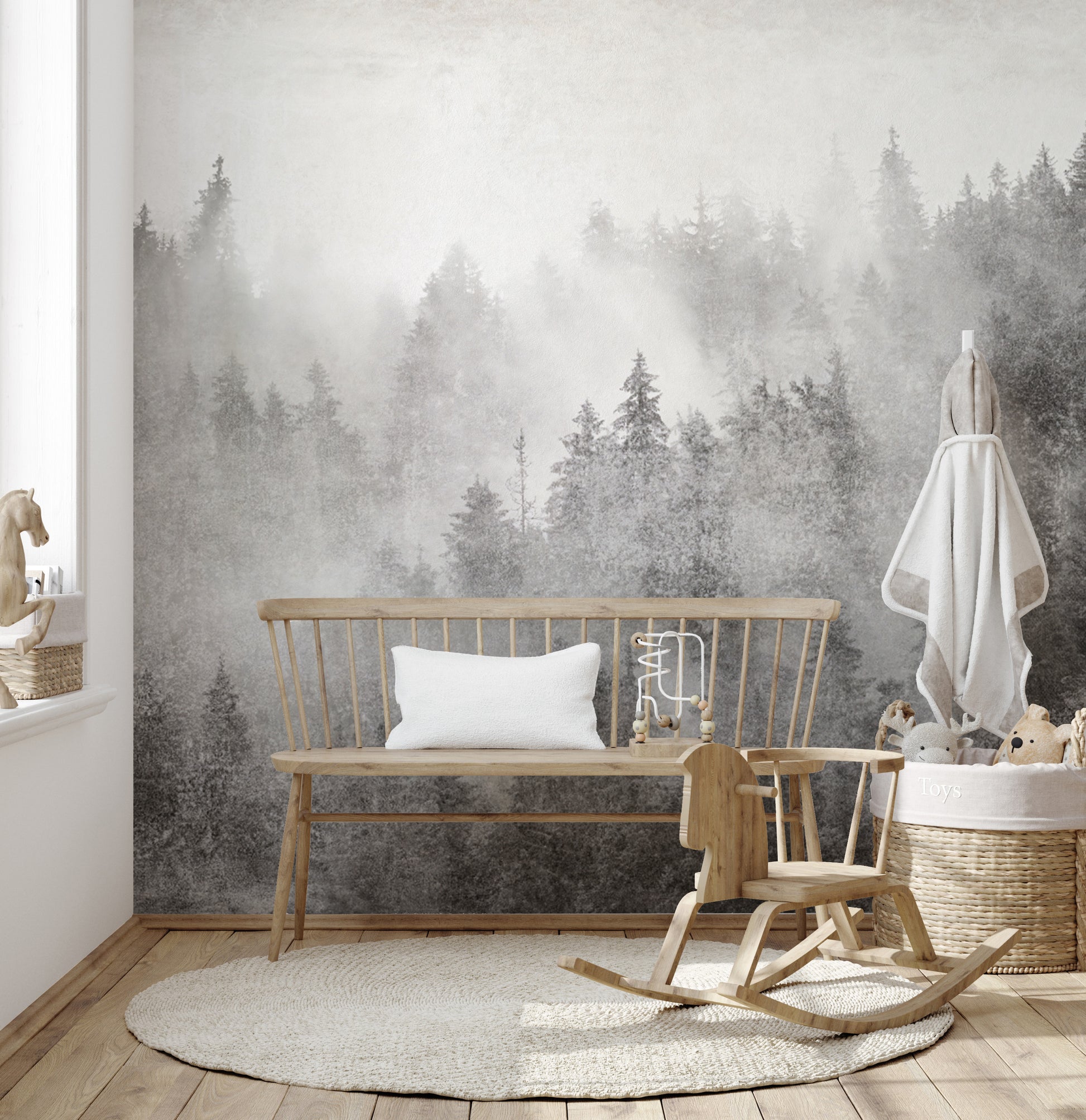 Foggy forest wallpaper in grayscale tones
