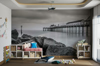 The style is photographic, with a focus on light, shadow, and texture in grayscale.
