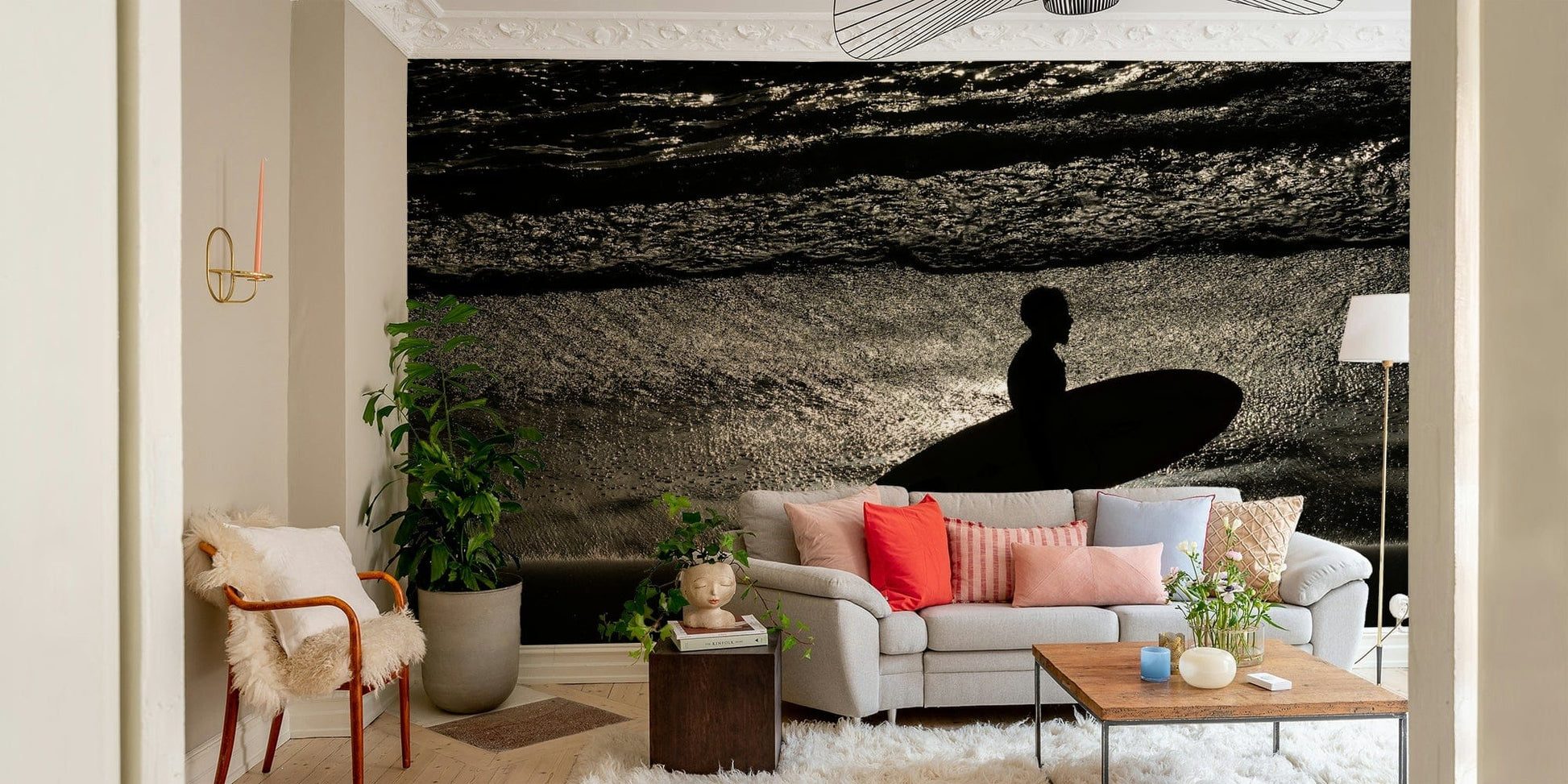 The wallpaper is used as a feature wall in a bedroom.

