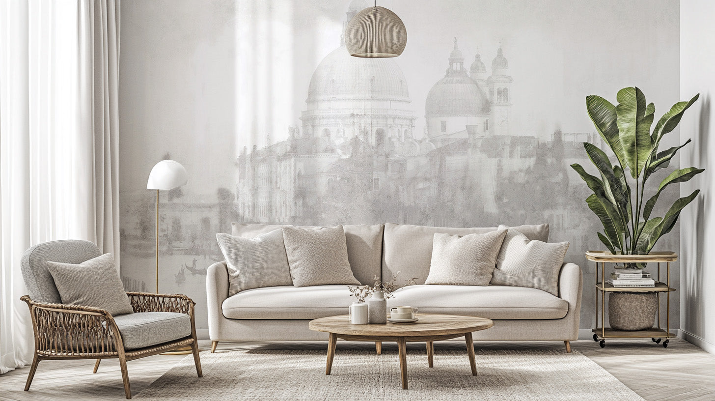 Monochrome Venice cityscape wallpaper mural with misty grey domes behind a beige sofa in a living room