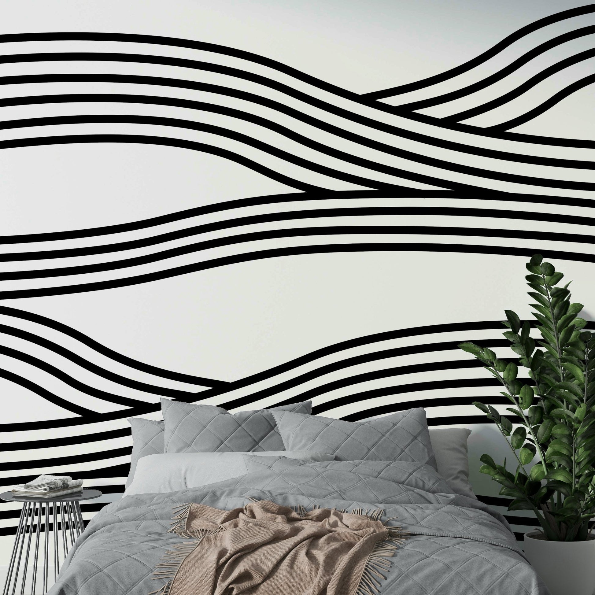 Contemporary monochrome mural featuring flowing wave lines.

