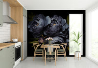 The colors are soft, muted tones of black, gold, and pink.

