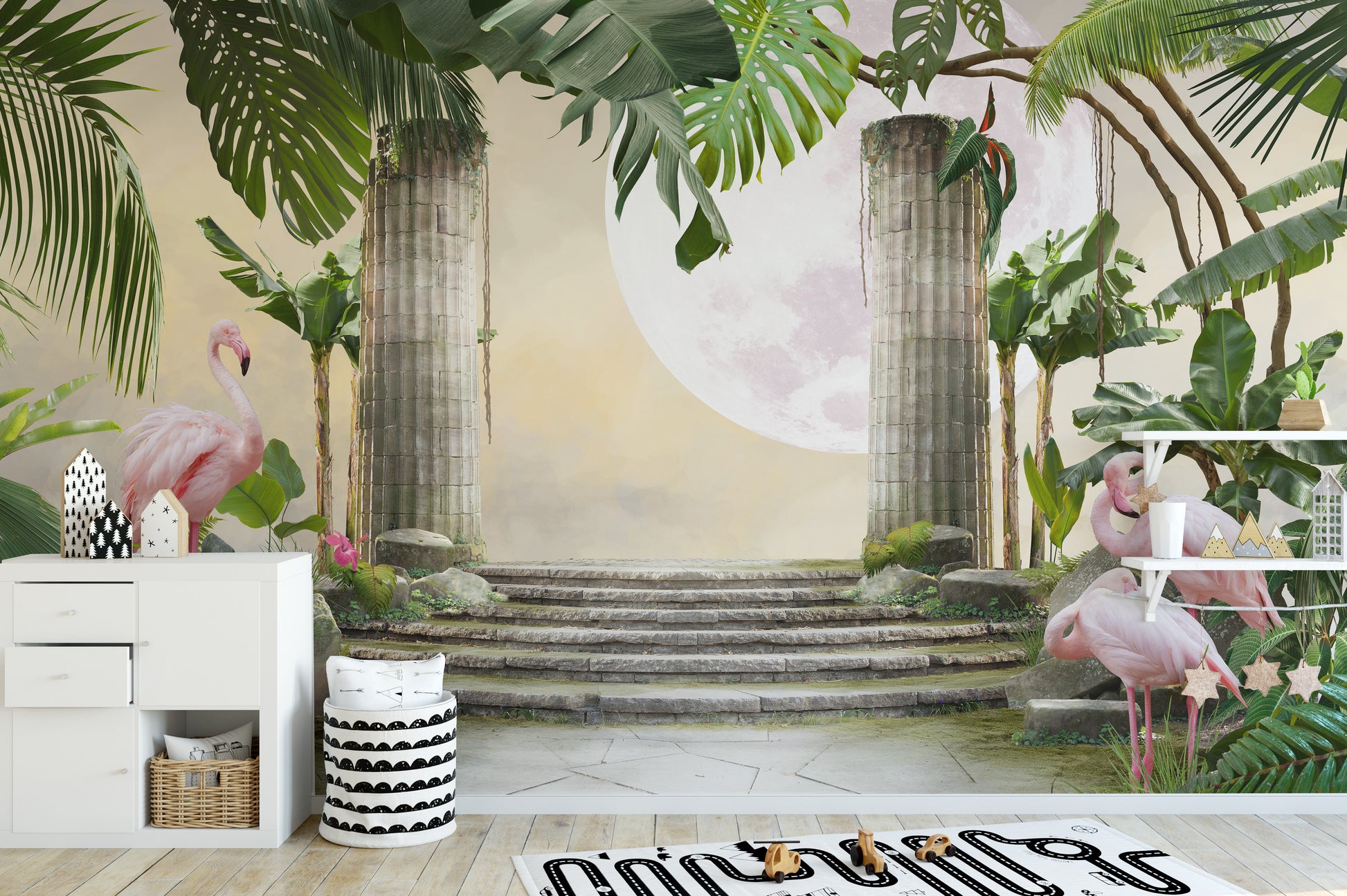 Moon Flamingo Banana Leave wallpaper mural of flamingos by stone columns above a white sideboard in a nursery
