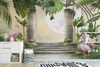 Moon Flamingo Banana Leave wallpaper mural of flamingos by stone columns above a white sideboard in a nursery