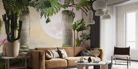 Moon Flamingo Banana Leave wallpaper mural with pink flamingo and pale moon behind a camel sofa in a living room