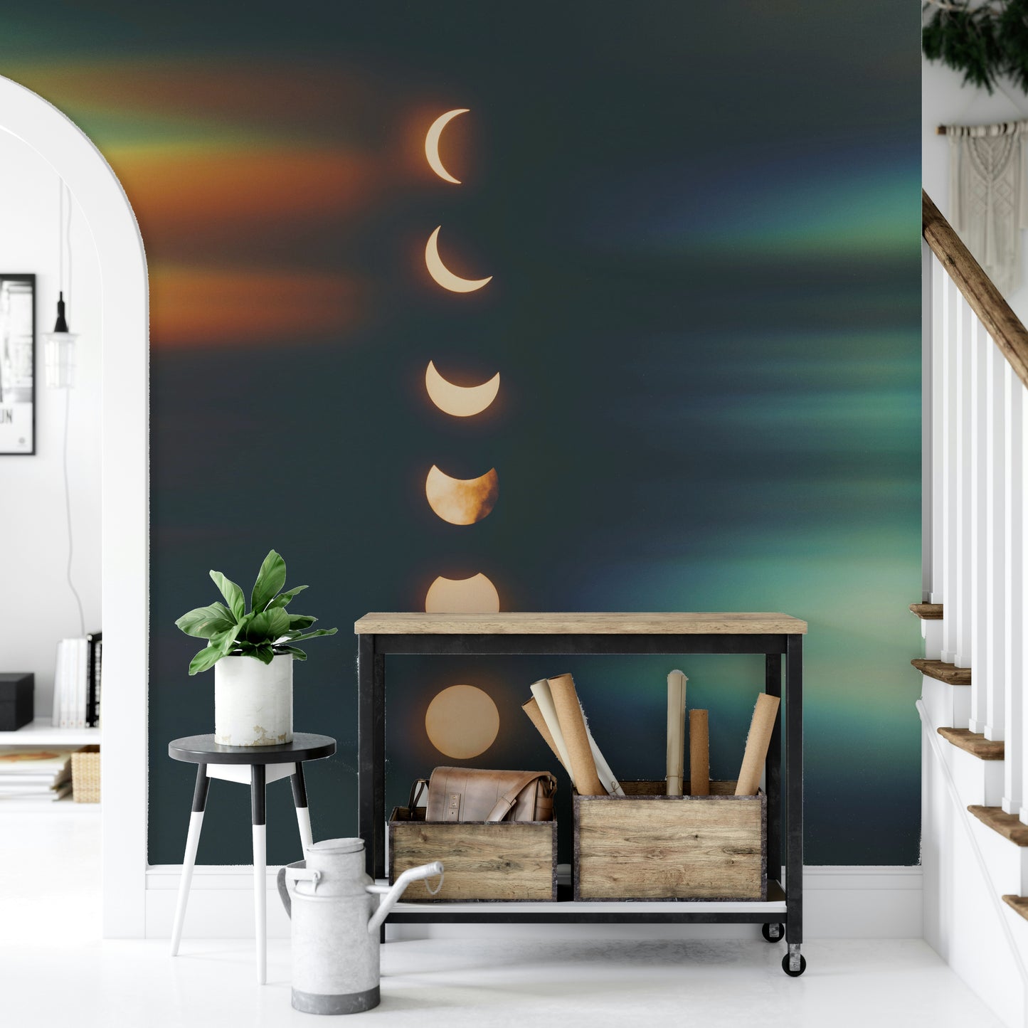 The mural has a dark background with light moons.

