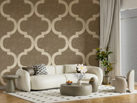 Ivory ogee pattern on textured burnished brass background wallpaper