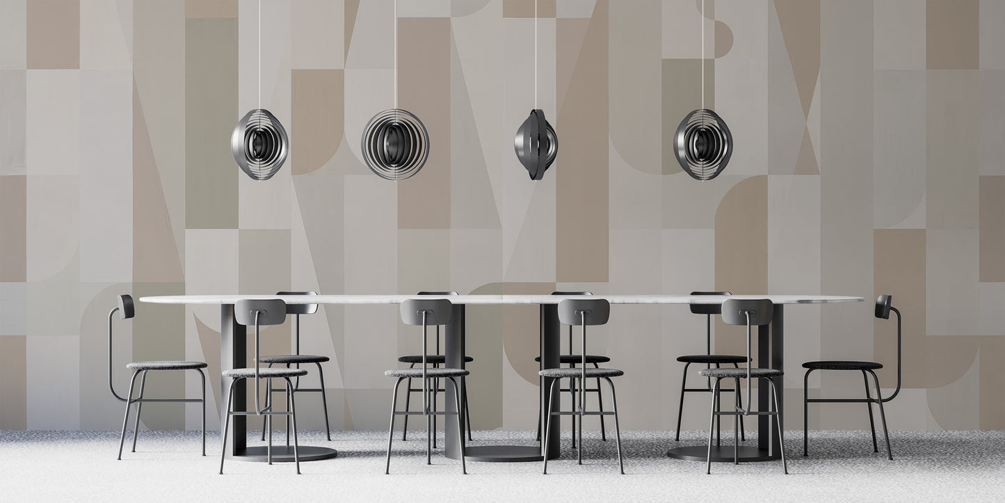 Mosaic Sepia Tones wallpaper of taupe and cream shapes in a dining room with a marble table and disc pendant lights