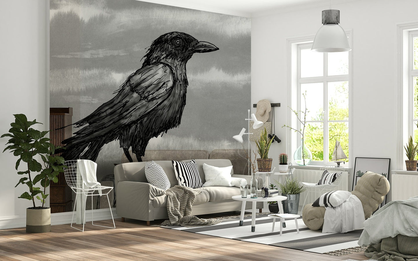 Mr Crow wall mural of an ink raven on moody grey behind a cream sofa in a bright living room