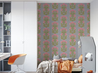 The image shows a symmetrical, Mughal-inspired floral design.

