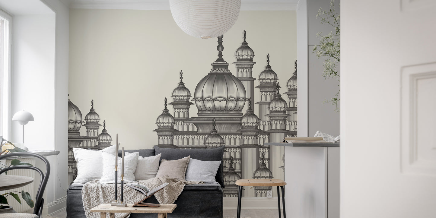 Mughal Palace wallpaper mural in grey behind a dark grey sofa and paper lantern in a living room