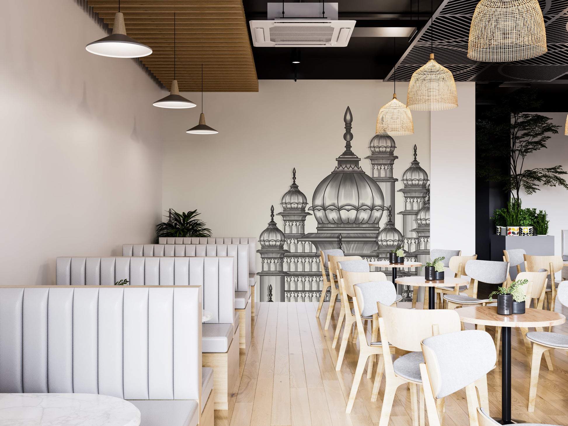 Mughal Palace wallpaper mural in grey domes behind white booth seating in a wood-floored cafe