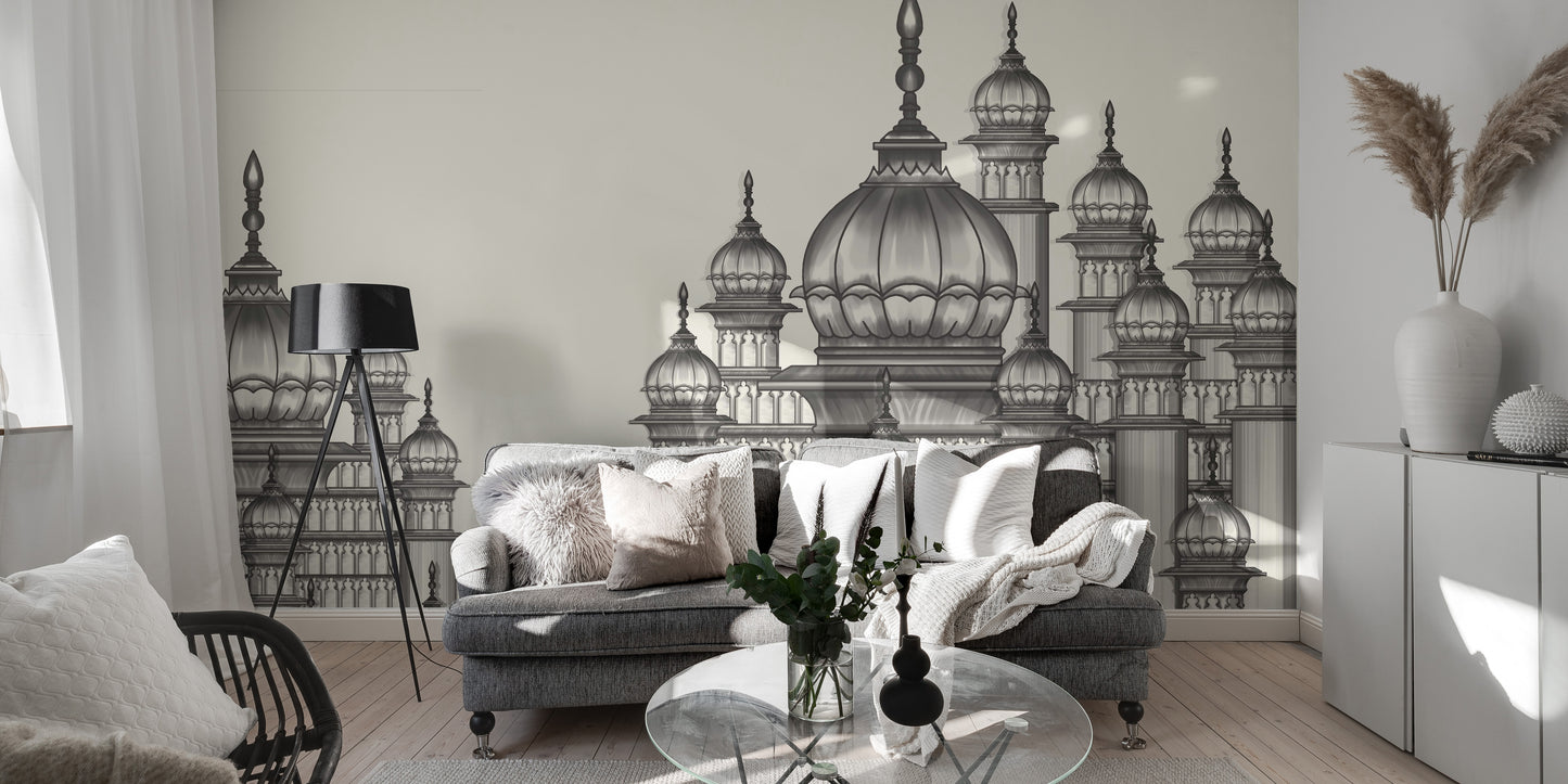 Mughal Palace wallpaper mural in grey behind a grey velvet sofa and tripod lamp in a living room