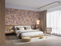 Multicolor Poesies Flowers wallpaper mural of soft floral colors behind a wooden platform bed in a serene bedroom