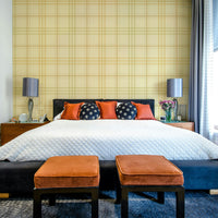 An artistic subtle pattern mural on minimalist wallpaper.

