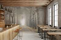 The mural shows a peaceful tree-lined road.

