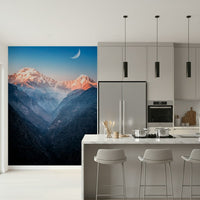 Soft dusk mountain mural behind sofa in modern apartment
