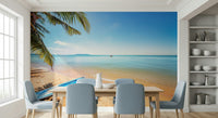 Na Jomtien wallpaper mural of a calm beach and blue sea behind a wood dining table and light blue chairs