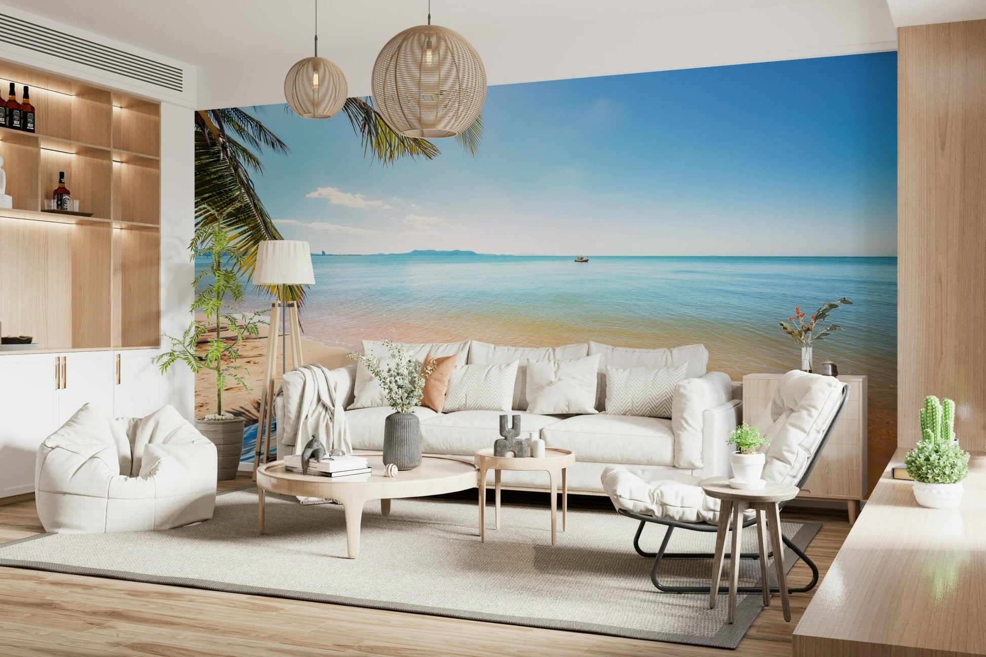 Na Jomtien wallpaper mural of a sunny beach and sea behind a white sofa and twin rattan pendants in a living room