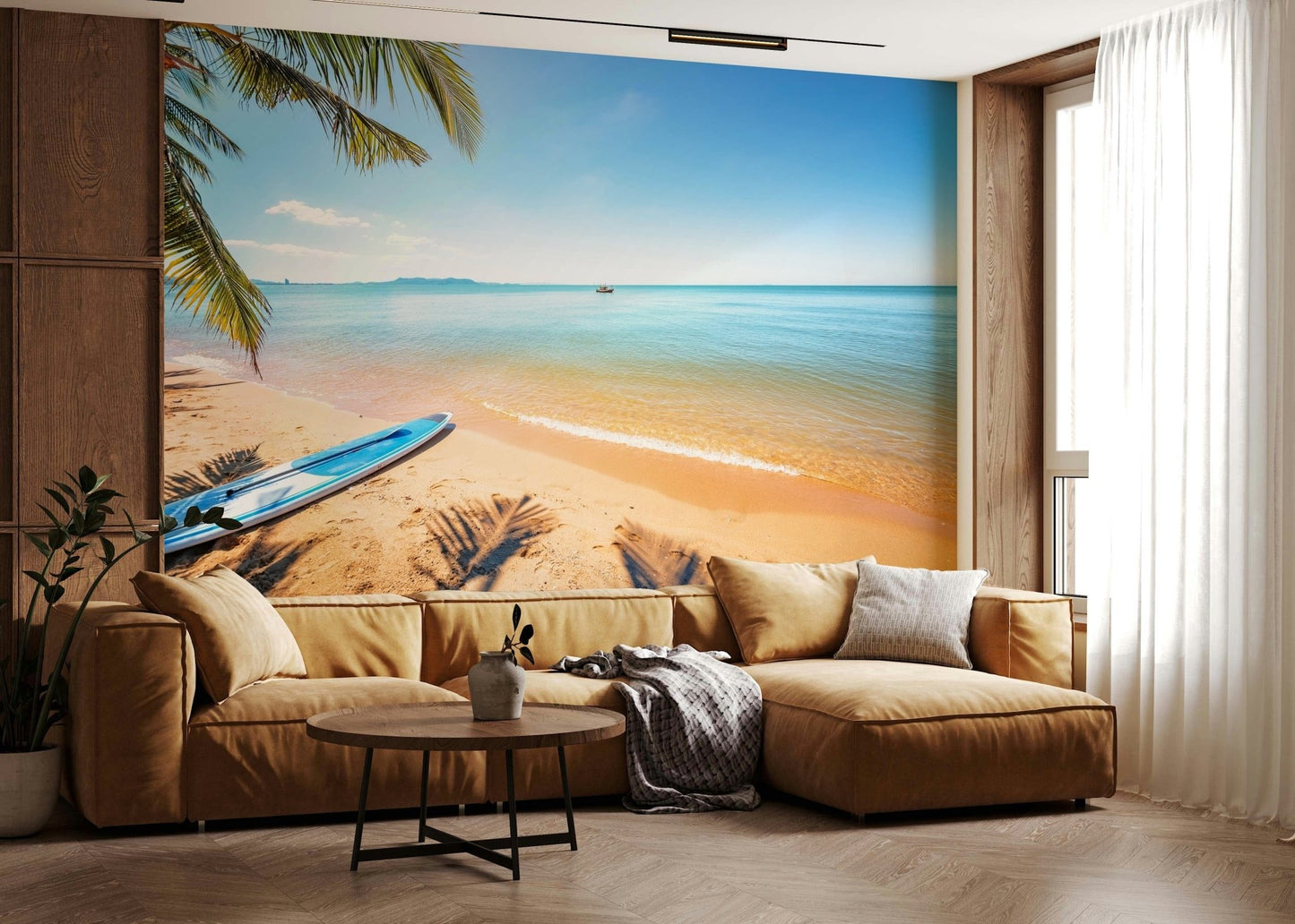 Na Jomtien wallpaper mural of a palm-fringed beach behind a tan leather sectional in a warm living room
