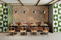 A high-angle view of the wall mural in a large space.