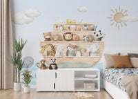 Nautical Adventure Animal Kids wallpaper above a white sideboard of plush toys next to a bed with rust and blue bedding