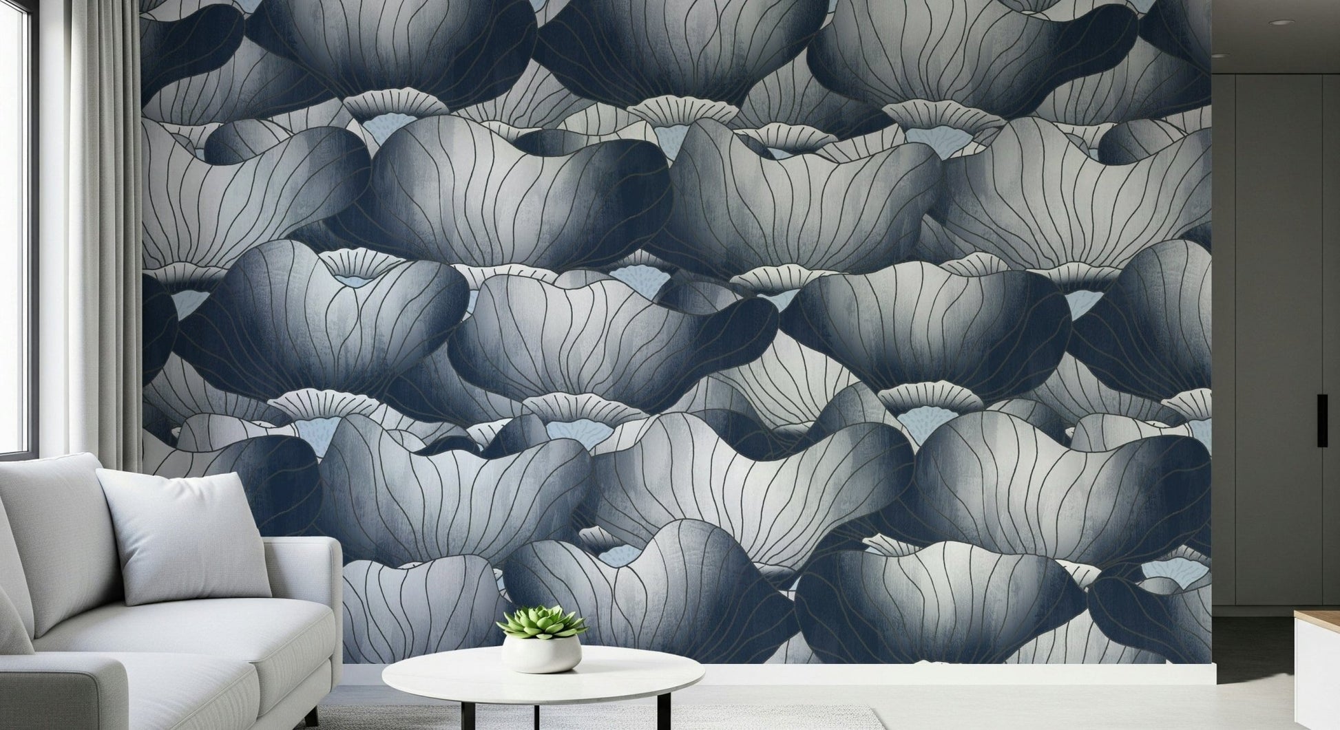 Navy Blue Botanical Bloom Waves wallpaper in deep blue behind a white sofa with a round table and small succulent