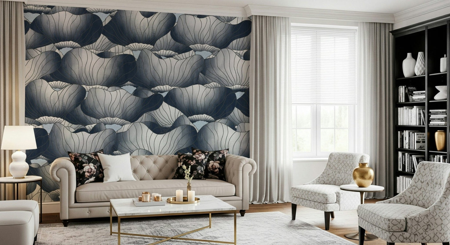 Navy Blue Botanical Bloom Waves wallpaper behind a cream tufted Chesterfield sofa with a gold and marble coffee table