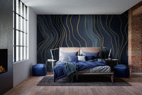 Navy Blue & Gold Chalk Lines wallpaper mural styled as a feature wall behind a dining table and chairs in blue tones