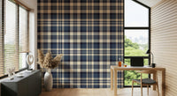 Tartan check wallpaper in navy hues for a cozy, sophisticated wall design.