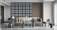 Navy tartan wallpaper with intersecting check patterns for a structured, stylish look.
