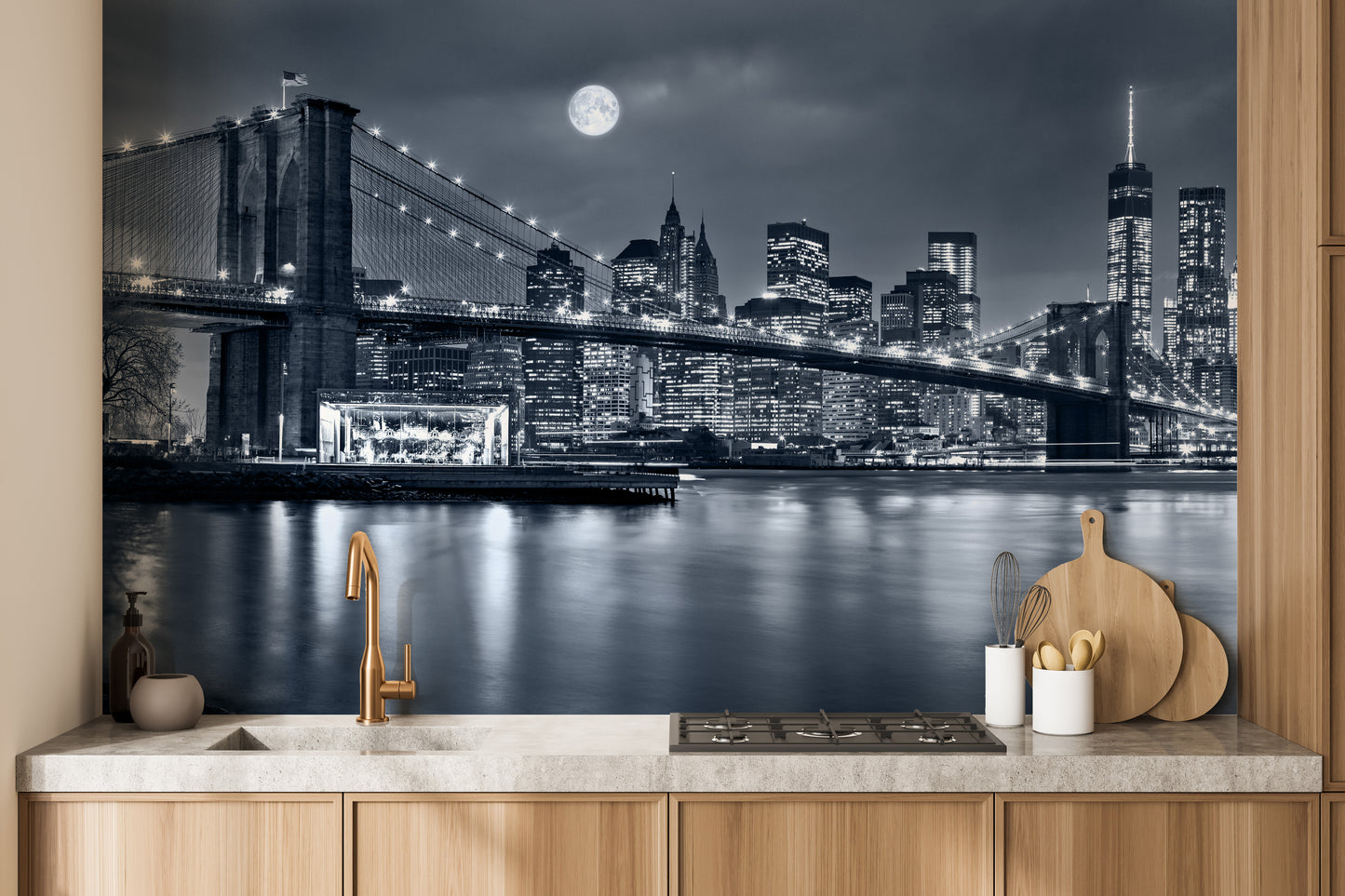 New York City Night View wallpaper mural with Brooklyn Bridge behind a wood counter and sink in a kitchen