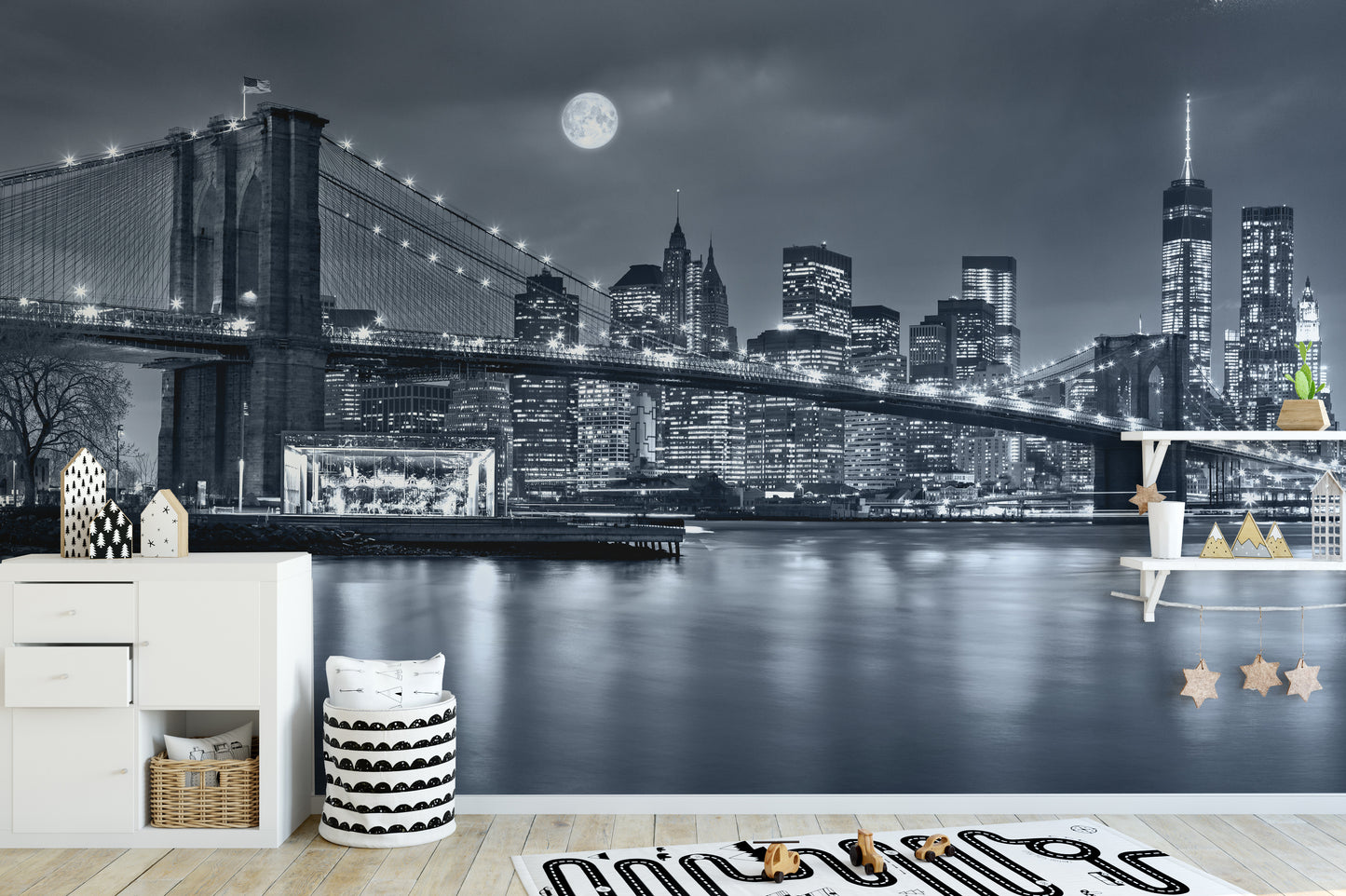 New York City Night View wallpaper mural with Brooklyn Bridge and full moon behind a white dresser in a kids room