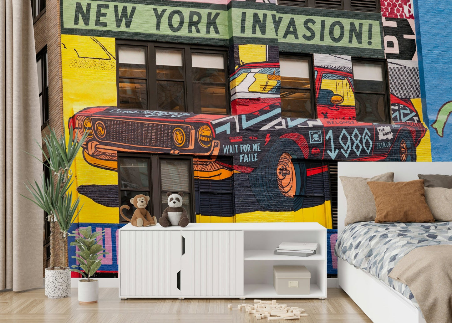 Colorful street mural with retro car and bold lettering

