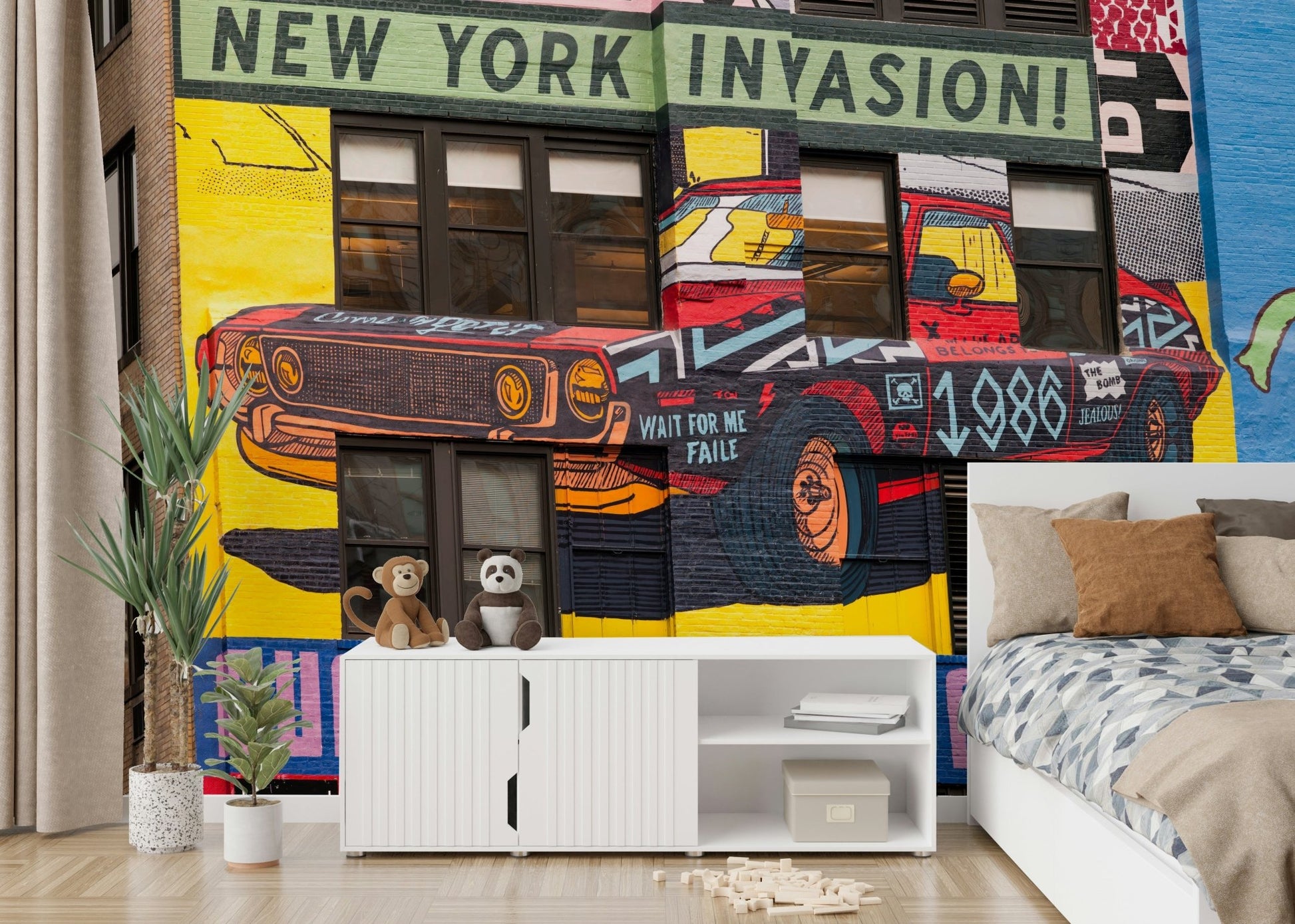 Colorful street mural with retro car and bold lettering

