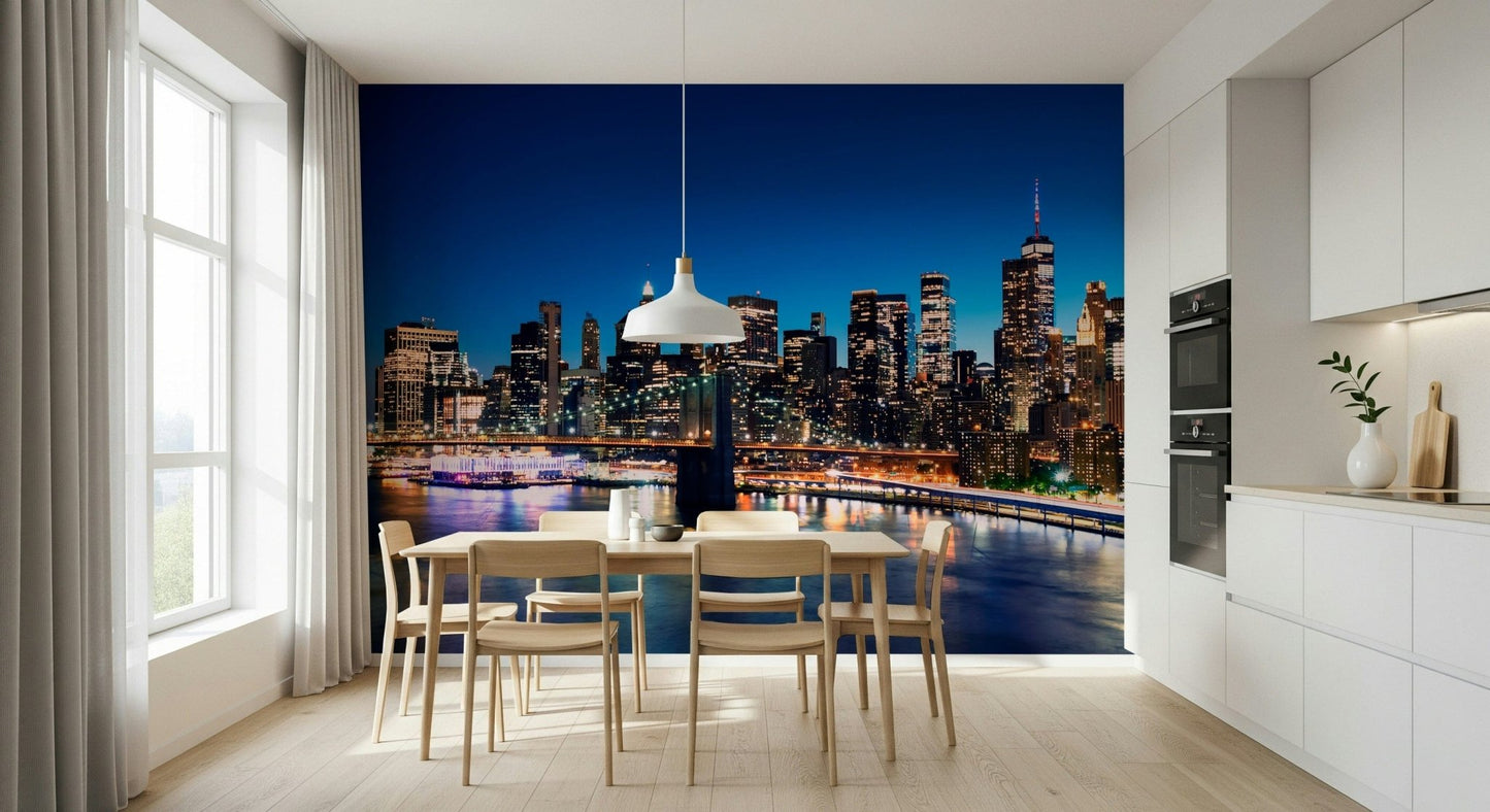 Night Metropolis wallpaper mural of a glowing night skyline above a wood dining table and chairs in a white kitchen