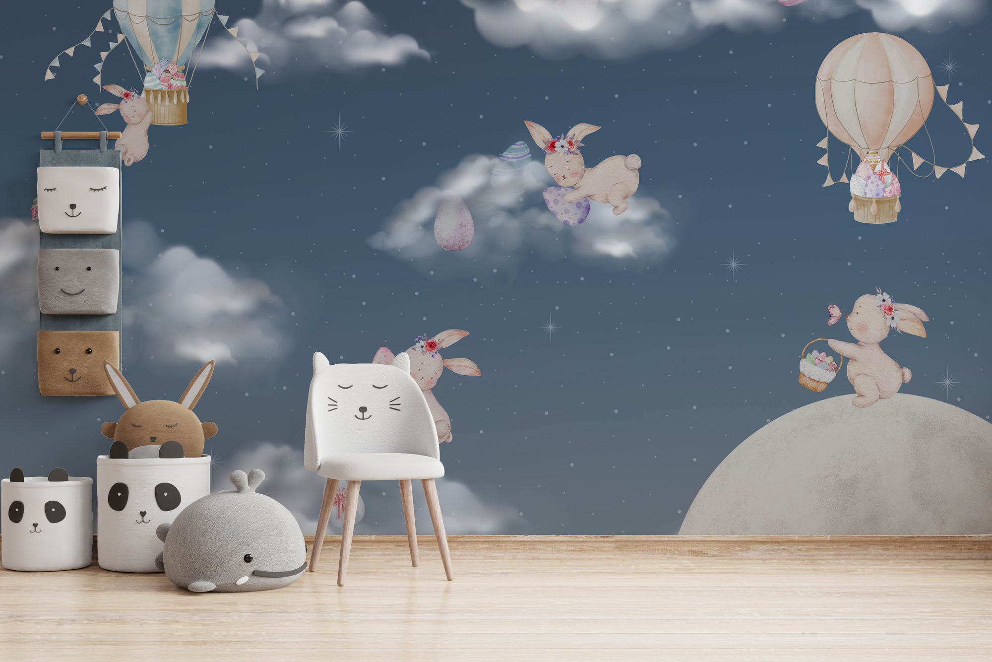 Night Sky Bunny Easter wallpaper mural of flying bunnies on starry navy behind a white cat chair and panda baskets