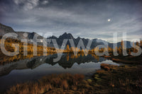 Scenic night water mural in lounge, dark blue color palette, modern wall decor backdrop